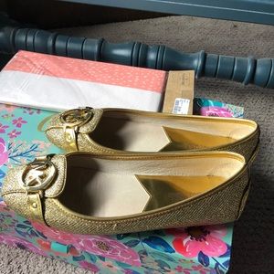 Michael Kors gold flats